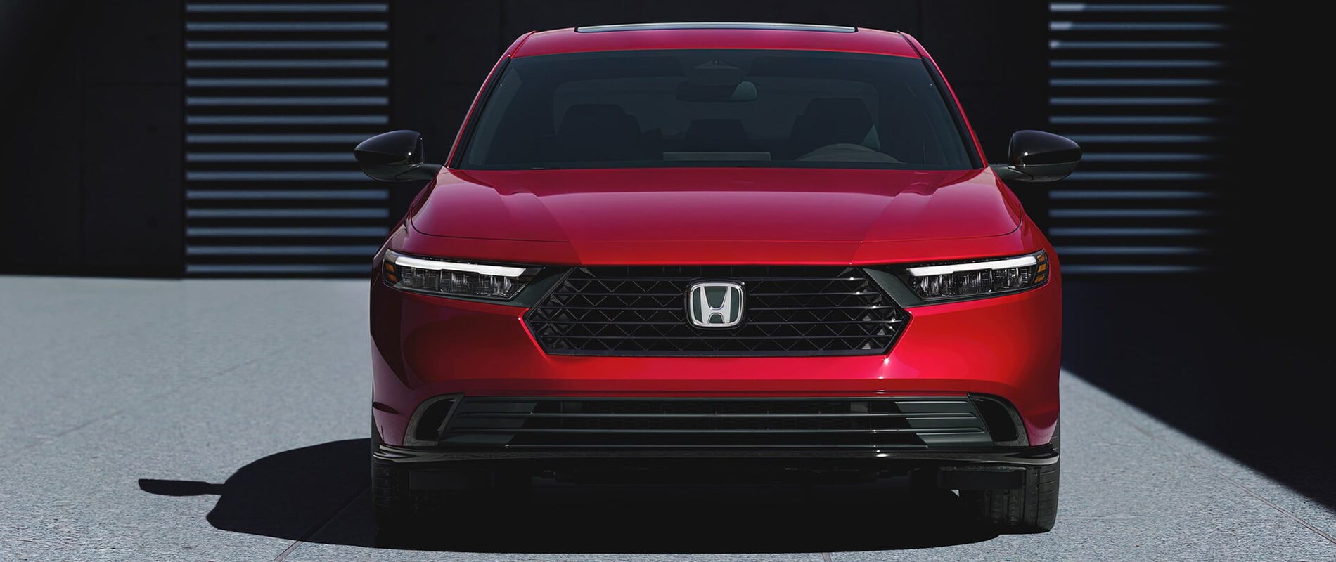 A front view of a red Honda Accord.